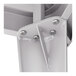 A close-up of a metal bracket for a Lancaster Table & Seating outdoor table.