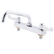 A silver Equip by T&S deck-mounted faucet with two wrist handles and an 8 1/8" swing spout.