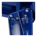 A close-up of a blue metal piece with screws for a Lancaster Table & Seating Sapphire Outdoor Table.