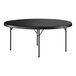 A large round black folding table with black metal legs.