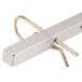 A metal bar with a metal ring at the end.
