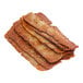 A stack of sliced plant-based vegan peppered bacon.