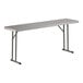 A gray heavy-duty blow molded plastic folding table with gray metal legs, measuring 18 by 72 inches.