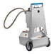 A Shortening Shuttle machine with a hose.