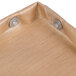 A tan Teflon fabric hot plate cover with metal buttons.