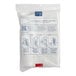 A white plastic bag labeled "World Centric 7" Spoon Refill Sleeve" with World Centric branding and 100 white plastic spoons inside.