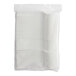 A plastic pack of white World Centric forks.