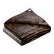 A folded brown and black chevron patterned CORE heavy duty tarp.