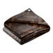 A folded brown and black chevron patterned tarp.