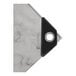 A white and black marble tarp cover with a black object in the corner.