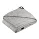 A folded white and grey CORE Extreme Heavy Duty tarp.
