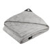 A folded white and grey tarp with black lettering.