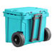 A sky blue CaterGator outdoor cooler with black wheels.