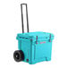 A sky blue CaterGator outdoor cooler with black wheels.