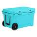 A sky blue CaterGator outdoor cooler with black wheels.