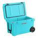 A sky blue CaterGator outdoor cooler with wheels.