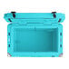 A CaterGator sky blue outdoor cooler with black handles and the lid open.