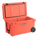 A white and orange CaterGator outdoor cooler with wheels.