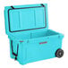 A CaterGator sky blue cooler with wheels.