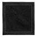 A black cloth napkin with white stitching.