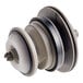 A white and grey plastic American Standard piston assembly.