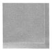A close-up of a grey cotton cloth napkin with white dots.