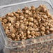 A white container of Phillips Gourmet Mushrooms Blend-Ready IQF roasted diced mushrooms.