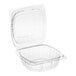 A Choice clear plastic hinged clamshell container with a lid.