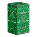A green box of Pukka Organic Supreme Matcha Green Tea bags with leaves on it.