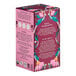 A white box of Pukka Organic Night Time Berry Herbal Tea Bags with pink flowers and leaves.