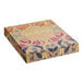 A white Pukka tea box with a floral design on it.