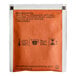 A Tazo Pumpkin Spice Chai tea bag packet on a white background.