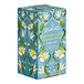 A blue and white Pukka tea box with flowers and leaves.
