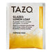 A white and yellow Tazo packet of lemon loaf herbal tea bags.