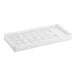 A white plastic Avantco Ice evaporator tray with holes.
