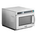 A Solwave stainless steel commercial microwave oven with a window and door on a white background.