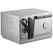 A silver Solwave commercial microwave with a black handle.