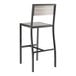 A black outdoor bar stool with gray faux teak slat seat.