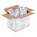 A box full of white packets.