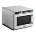 A Solwave stainless steel commercial microwave with a silver door and window.