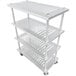 A stainless steel four-shelf louvered utility cart with wheels and 61-inch posts.