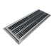 A close-up of a stainless steel floor trough grate with metal bars.