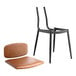 A black Lancaster Table & Seating chair with a brown vinyl padded seat and backrest.