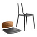 A black Lancaster Table & Seating chair with a black vinyl seat and vintage wood backrest.