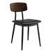 A Lancaster Table & Seating black dining chair with a black seat and wood back.