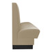 A beige booth with a black base.
