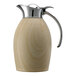 A wooden carafe with a stainless steel lid and handle.