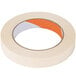 A roll of Shurtape CP 105 natural masking tape with orange and white stripes.