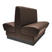A QA Group brown leather double back booth with a black base.