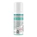 A white bottle of Batiste Original Dry Shampoo with green text.